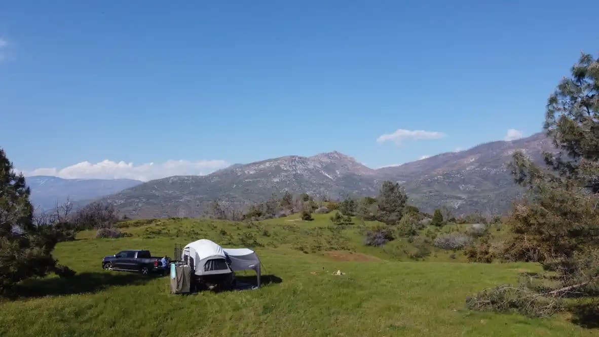 Dirt bikes at camp in Sierra National Forest