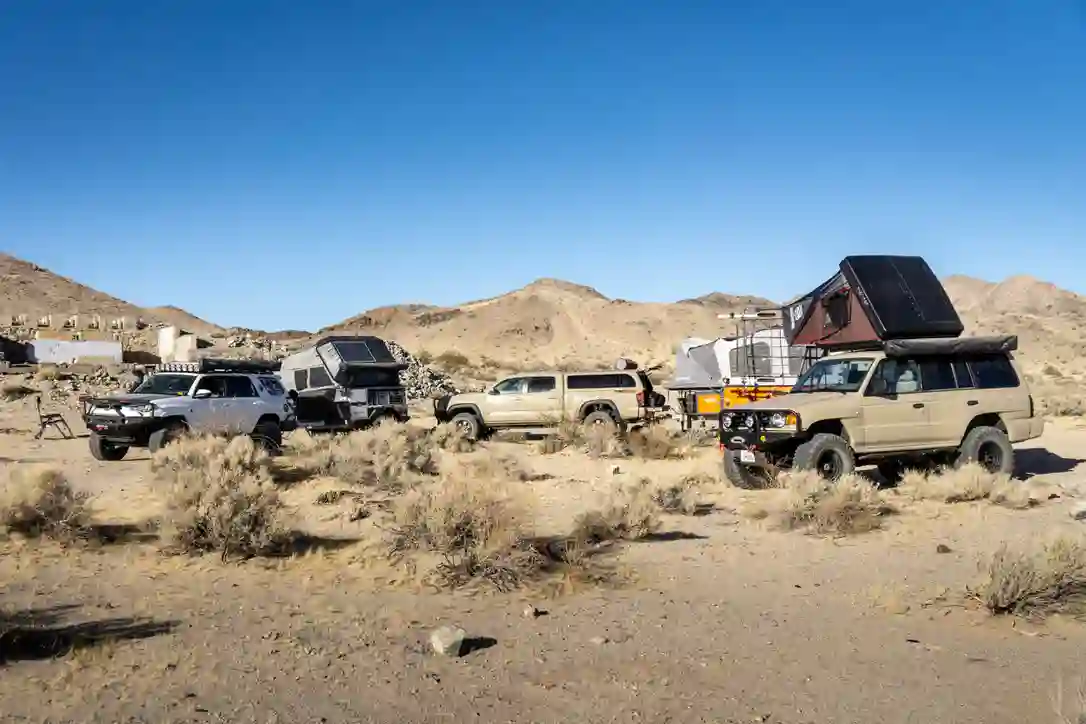 The group's rigs stopped in the desert