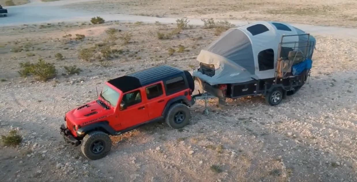 OPUS OP2 towed behind a Jeep on a cross-country trip