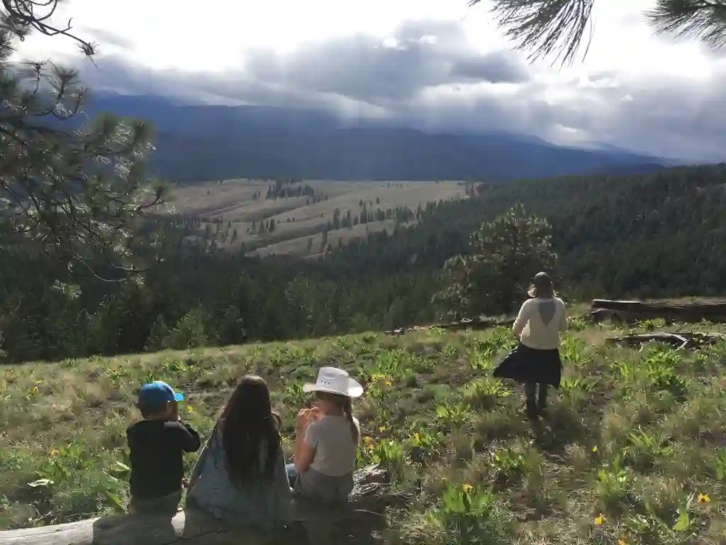 The family taking in the mountain view above camp