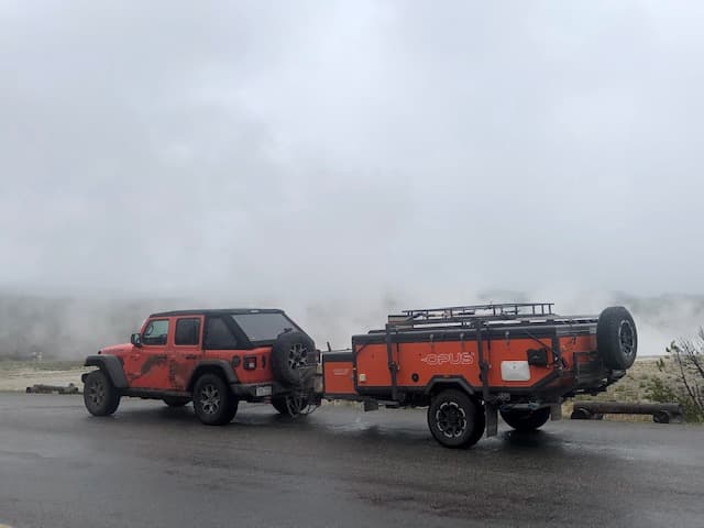 Jeep and OP4 among the geyser steam in Yellowstone
