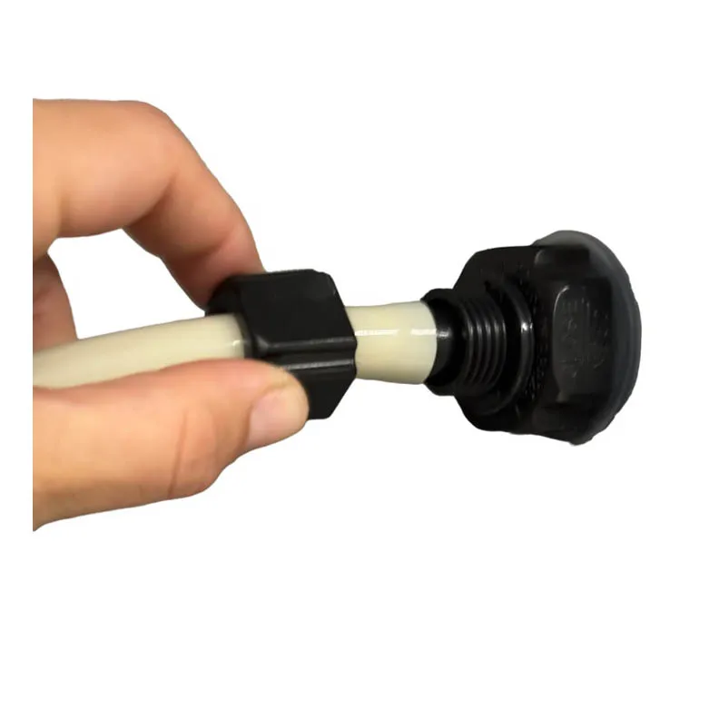 Pushing the gray tube on to the valve
