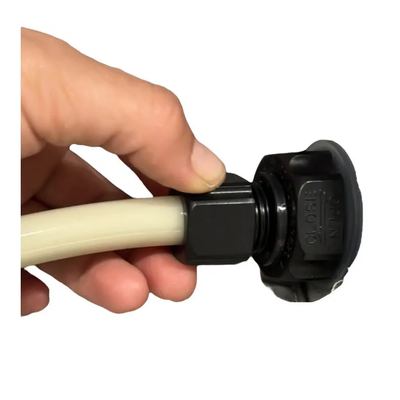 Threading the valve top over the tube and twisting it on