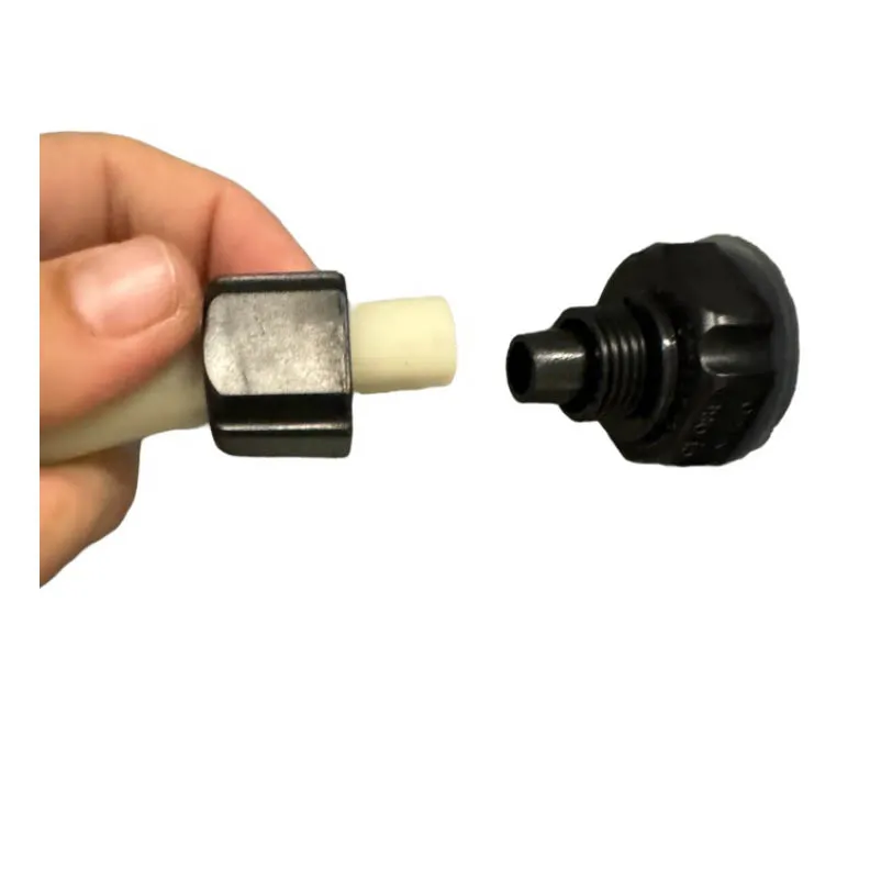 Unscrewing the top of the black valve