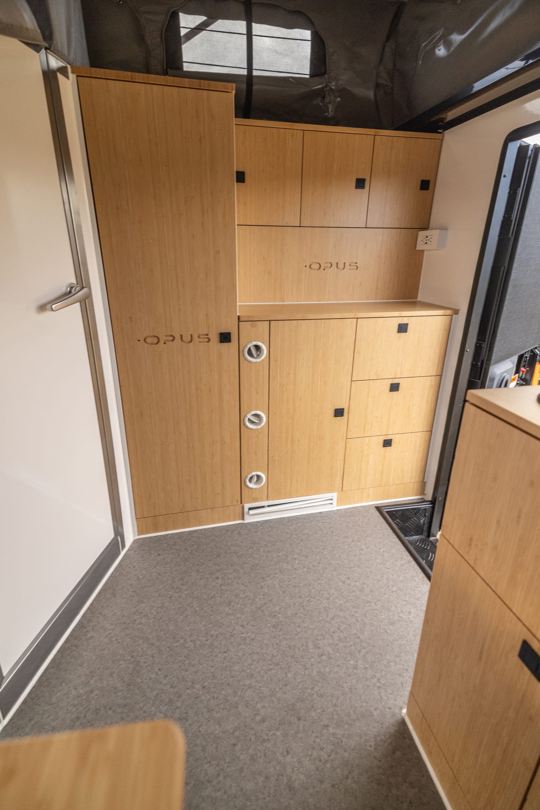 OP13, Interior · bamboo cabinetry and ensuite door