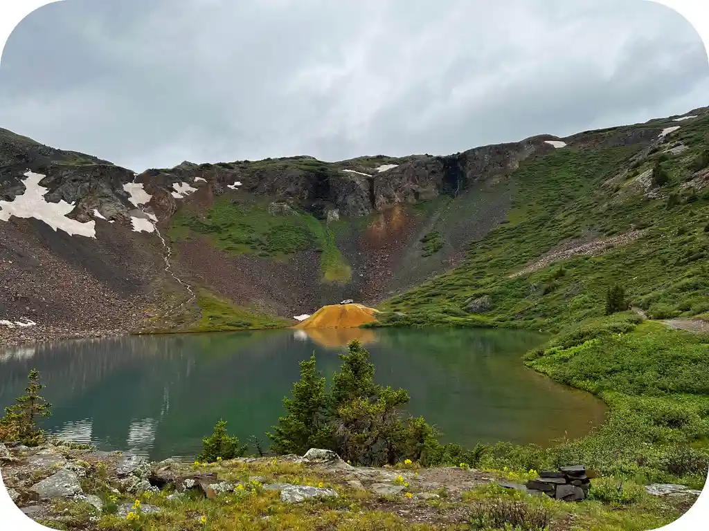 OPUS camper scenic camping view near mountain lake landscape