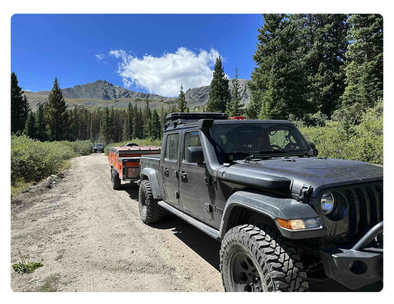 Jeep towing camper trailer OPUS Camper Mineral Basin
